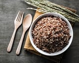 Bowlful of white and brown rice ready for eating