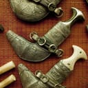 traditional Omani silver daggers on display