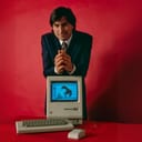 Steve Jobs and Macintosh computer, January 1984.
