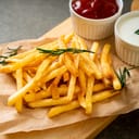 French fries or potato chips with sour cream and ketchup