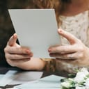 Woman preparing a wedding invitation card