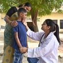 An Indian doctor doing social service at a village