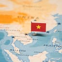 Vietnamese flag pinned to the world map showing the location of the country