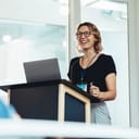confident businesswoman delivering a speech at a professional seminar