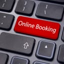 A key on a keyboard labeled Online Booking