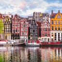 The Netherlands' canal with colorful houses and boats
