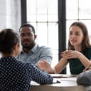 Coworkers having a discussion at a meeting