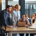 Team of professionals having a meeting in a digital marketing agency.