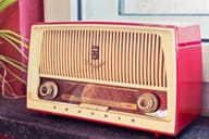 A red and white vintage radio