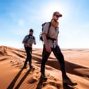Two men trekking in the desert