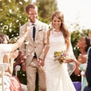 Bride and groom walking down the aisle