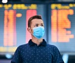 Man wearing a mask at the station