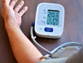 Person digitally taking their blood pressure