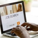 A person looking for a job online