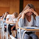Group of students taking an exam