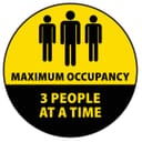 A notice showing that only three people at a time are allowed to be inside