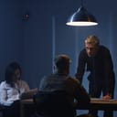 dark room interrogation scene police officer