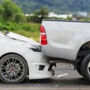 Car accident involving two cars on the road