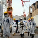 group of IAEA experts leaving Unit 4 at the Fukushima Daiichi Nuclear Power Station, 2013.