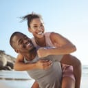 A couple enjoying their time at the beach