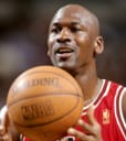 Michael Jordan as Chicago Bulls player holding a basketball