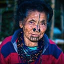 apatani tribal women facial expression with her traditional nose lobes and blurred background image is taken at ziro arunachal pradesh india. it is one of the oldest tribe of india.