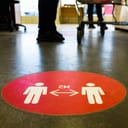Floor sign for keeping the distance between people 2m