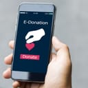 Close-up of a smartphone while making an online donation