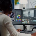 A designer working on their computer