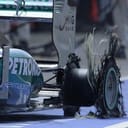 close-up of the puncture of the left rear wheel on Lewis Hamilton's Mercedes during the race, 2013.