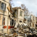 Heavily damaged residential buildings