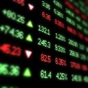 colored ticker board displaying information on a black background
