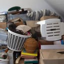 Cluttered room with various objects