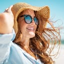 Woman wearing summer clothes smiling
