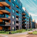 Row of residential buildings with green area in front