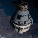 Boeing's CST-100 Starliner docked at ISS's Harmony module, flying 261 miles above the Pacific near Nayarit, Mexico