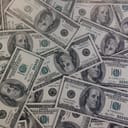 A pile of $100 bills