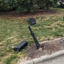 broken mailbox on the street