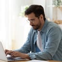 A young man working on his laptop
