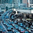 Cars standing still during a traffic jam at a large highway intersection