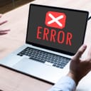 Laptop displaying 'error' sign across the whole screen