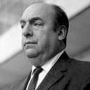 Portrait image of Pablo Neruda in black and white
