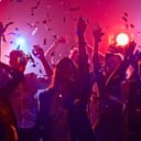 Young people dancing in night club