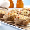 served baked mushrooms stuffed with cheese