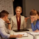 Upset people during a business meeting