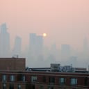 Orange Sun Wildfire Haze In New York City Manhattan Skyline