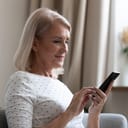Middle-aged woman using a smartphone