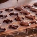 Pouring chocolate into a mould