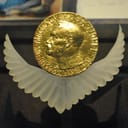 Nobel Peace Prize medal awarded to Rigoberta Menchú, on display at the Templo Mayor Museum in Mexico City