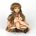 a collectable porcelain doll isolated